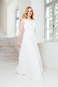 Glücksmoment Brautmode in Oldenburg eco Brautkleid Fluegelaermel Roeschen